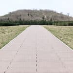 Tree-covered hill Hanyang Mausoleum with winding path and sparse grass creating serene atmosphere - Forever Legacy premium custom mausoleums USA, expert craftsmanship guarantee.